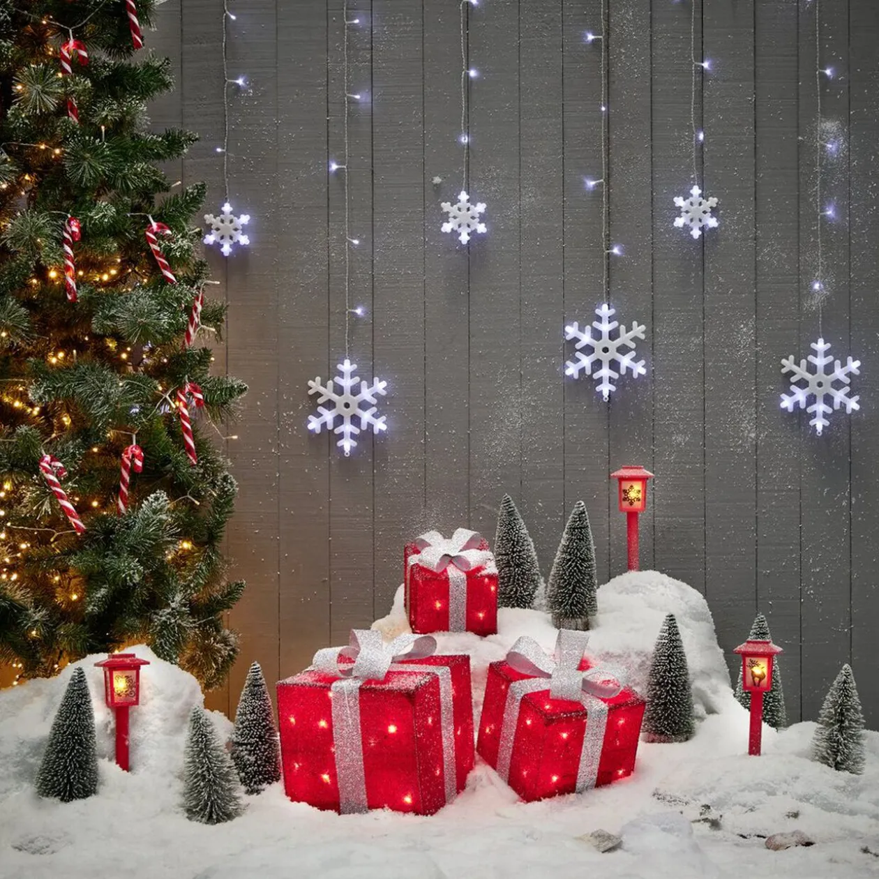 Borne solaire lanterne rouge vintage 10LED blanc chaud effet flamme H37cm