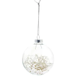 Boule de Noël en verre avec feuille séchée