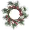 Couronne de Noël ronde branche sapin vert et baies rouges