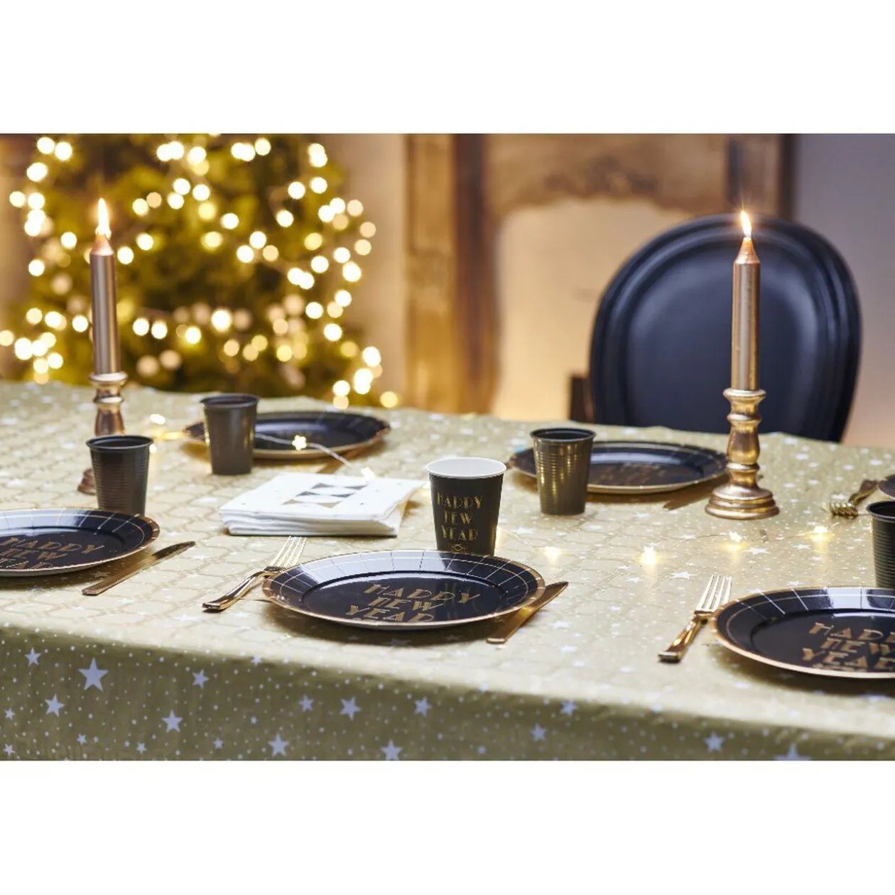 Nappe damassée en papier doré motif pluie d'étoiles blanches