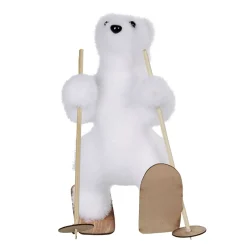 Ours blanc avec skis à poser