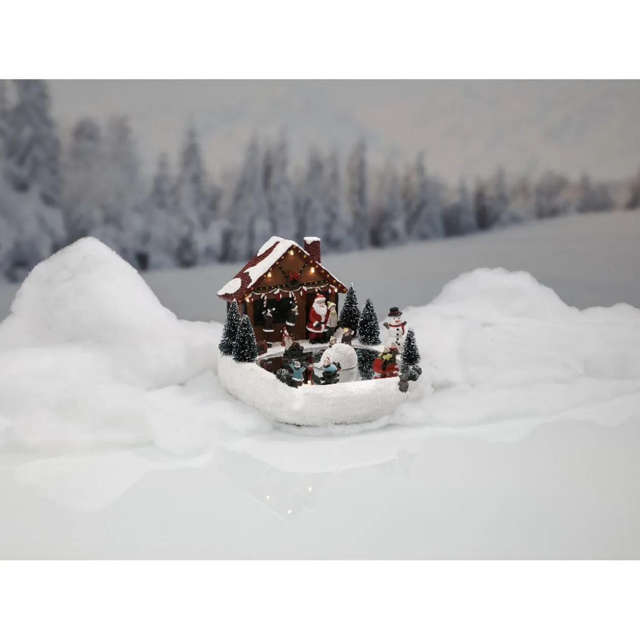 Patinoire chalet animé effet miroir village Noël