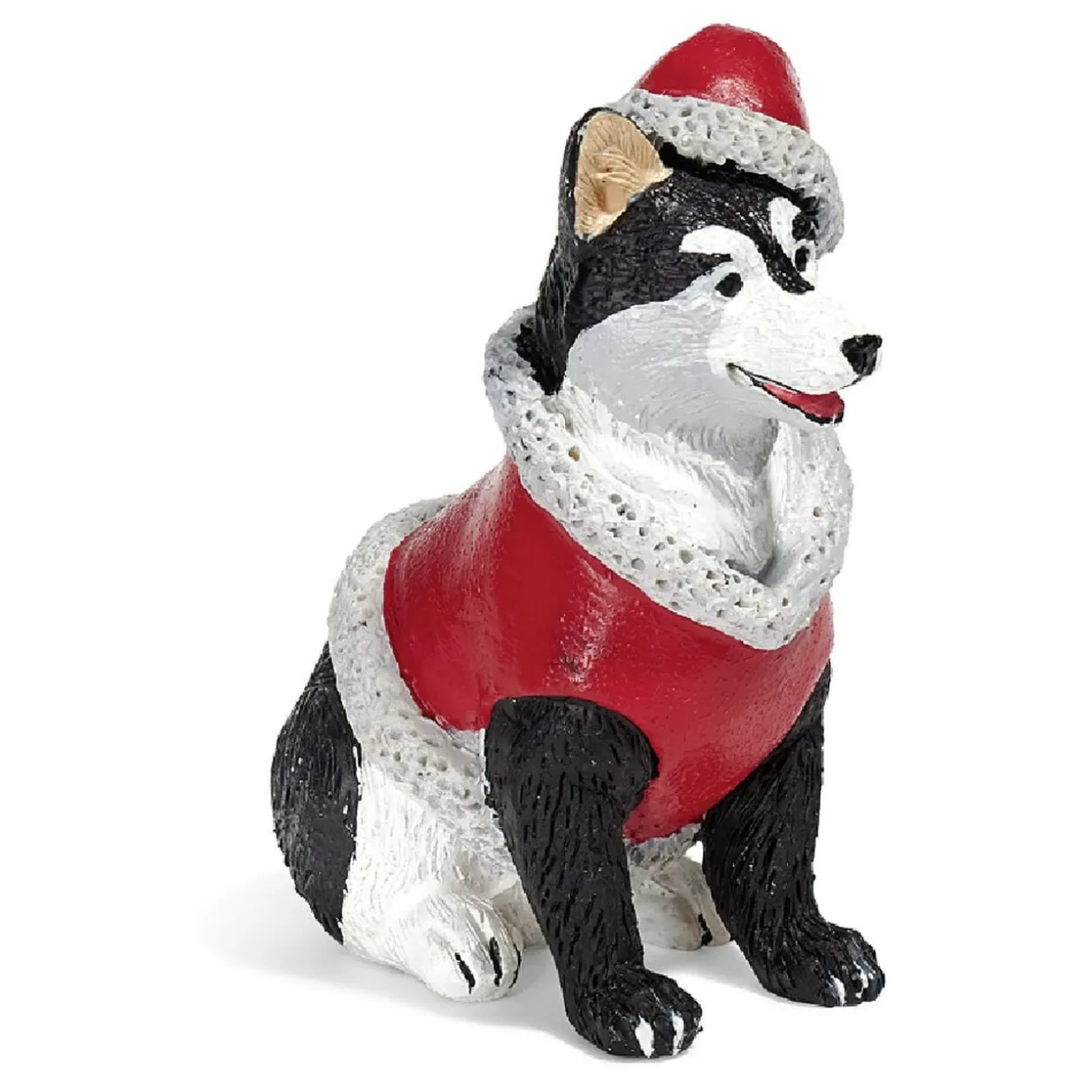 Personnage village de Noël chien avec manteau et bonnet rouge