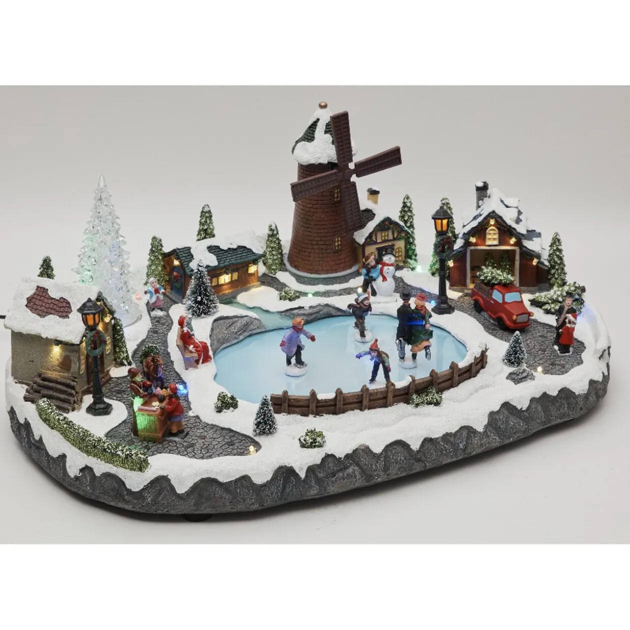 Petit village animé patinoire Noël