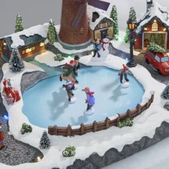 Petit village animé patinoire Noël
