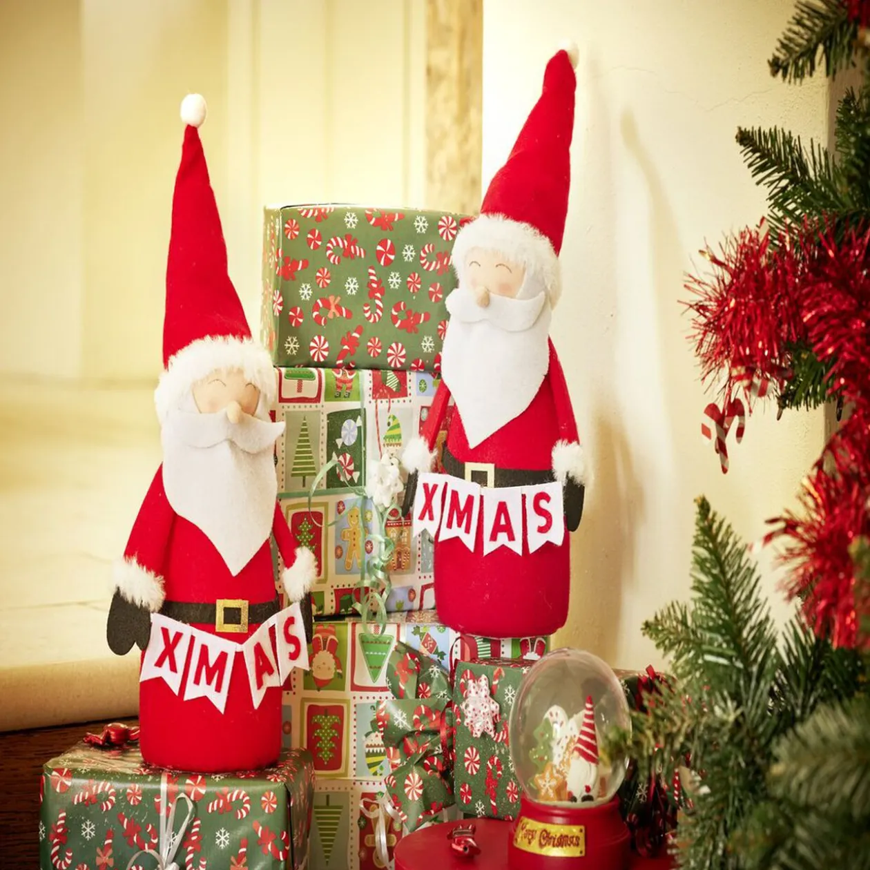 Père noël à poser en feutrine Ø14xH40cm