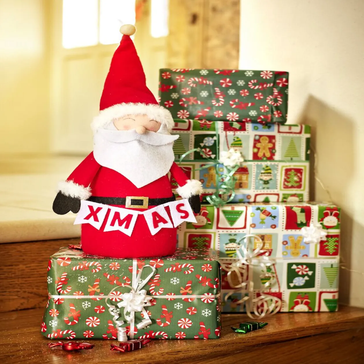 Père noël à poser en feutrine Ø14xH40cm