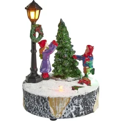 Scène village de Noël avec lanterne lumineuse