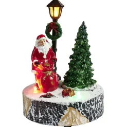 Scène village de Noël avec lanterne lumineuse