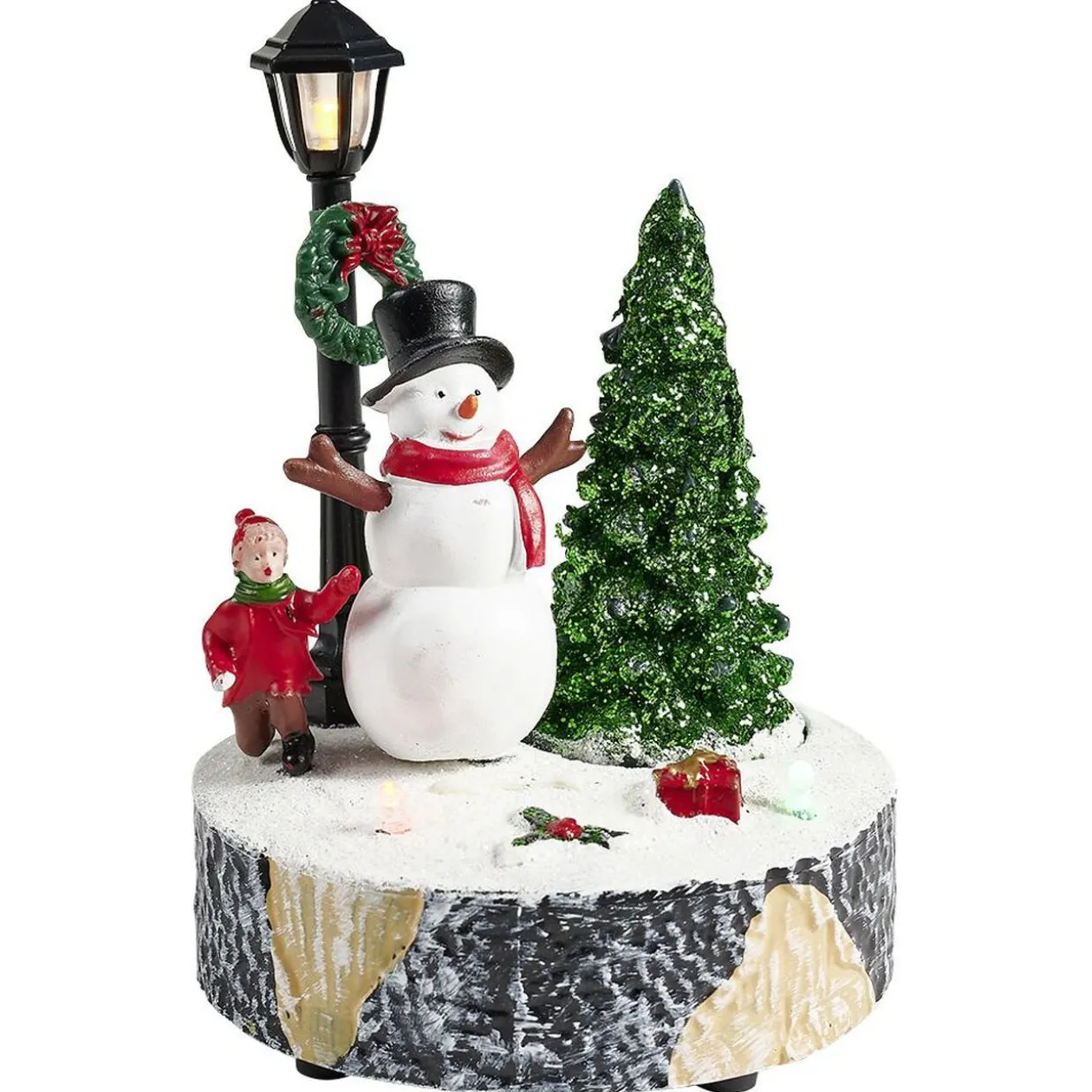 Scène village de Noël avec lanterne lumineuse