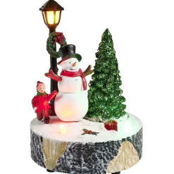 Scène village de Noël avec lanterne lumineuse