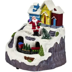 Scène village de Noël lumineuse avec train animé