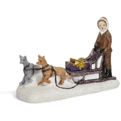 Sujet de Noël personnage sur traineau avec chien en résine